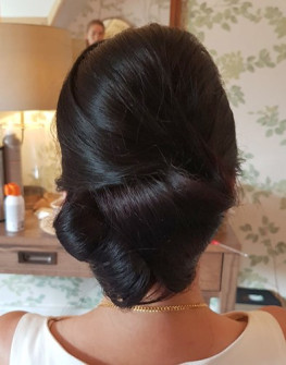 Large loose knotted up do wedding hair
