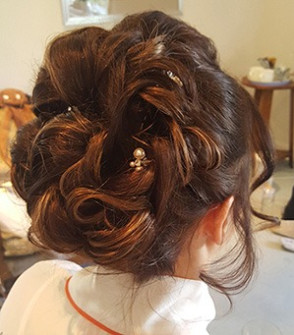 messy up do curled wedding hair style