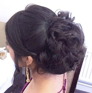 large messy bun bridal wedding hair